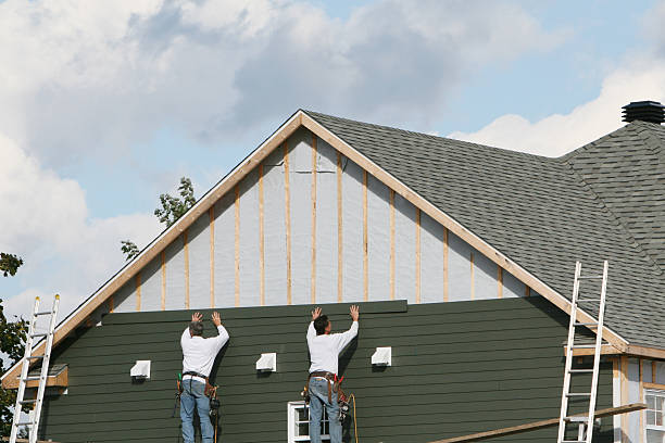 Professional Storm Damage Siding Repair technician working in Sykesville, MD